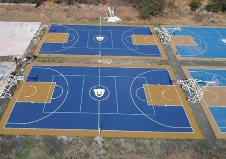 Canchas de basquetbol de PUMAS en Ciudad Universitaria, CDMX, pintadas por PLAYKO